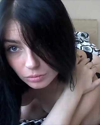 Happy dark-haired babe reveals her intimate areas
