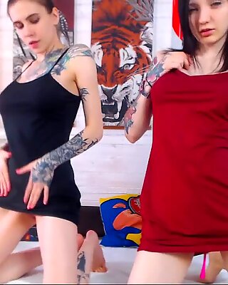 Two amateur brunette lesbians with big tits on webcam
