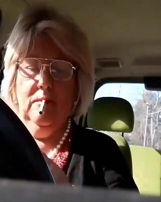 Italian granny masturbates in her car